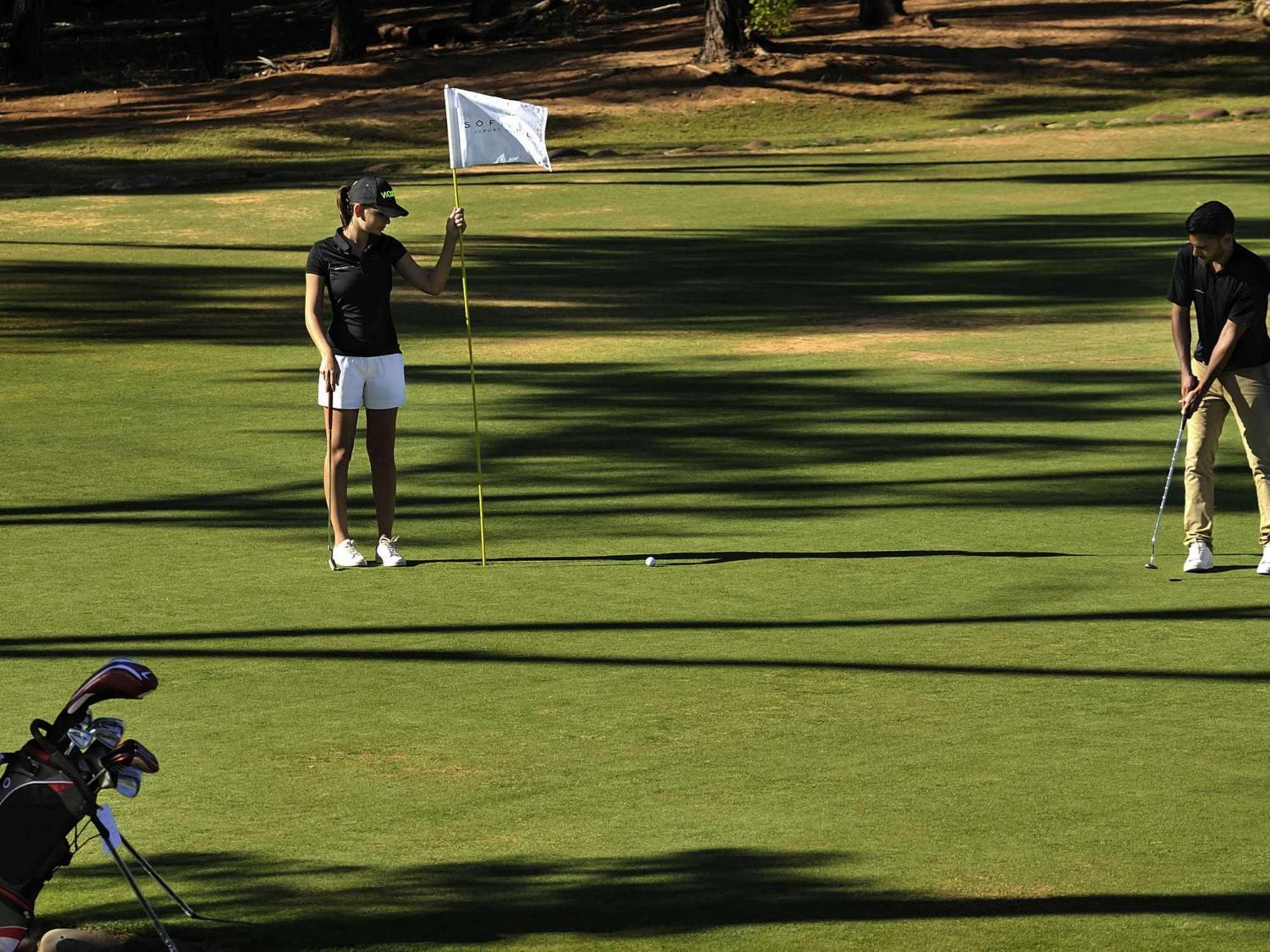 Sofitel Agadir Royal Bay Resort Exterior photo Golfers on the green